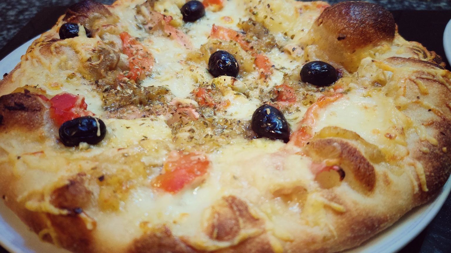 Fem pizza a casa - Trucs i receptes per fer una bona pizza a casa